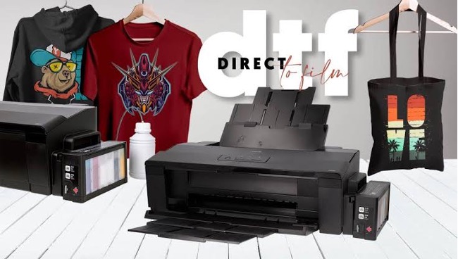 Direct-to-film printer with printed hoodies and shirts